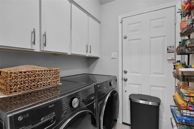 a kitchen with a stove and a cabinet