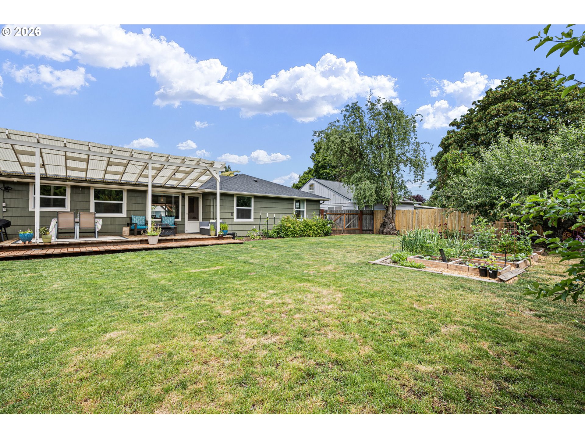 765 Louis Street Eugene, OR 97402 - Photo 34 of 45 a house view with a garden space