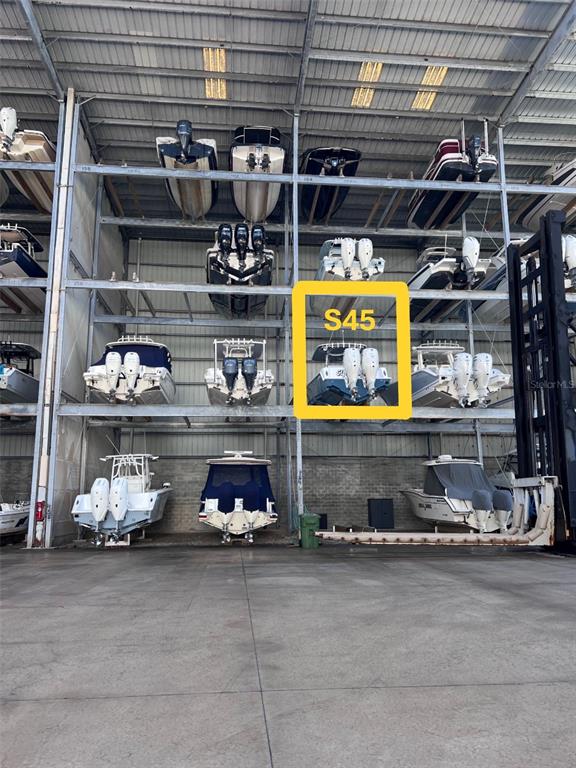 a room with lot of different colored cloths