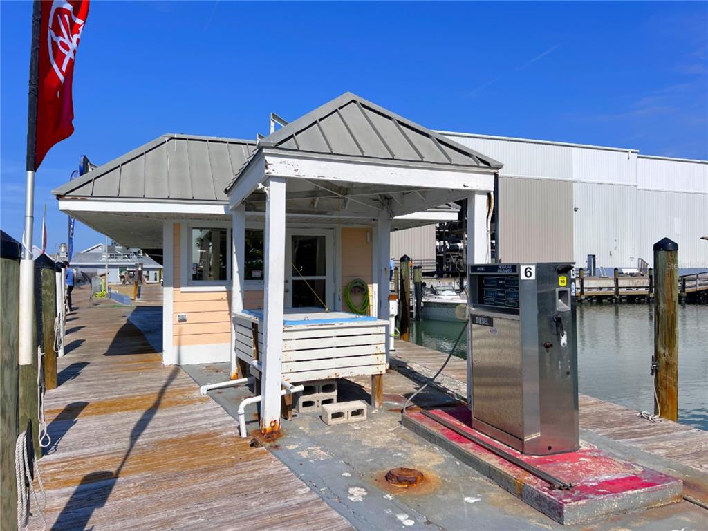 100 Circuit Road, Unit S45 Nokomis, FL 34275 - Photo 8 of 14 a view of a dinning room with wooden floor and lake view
