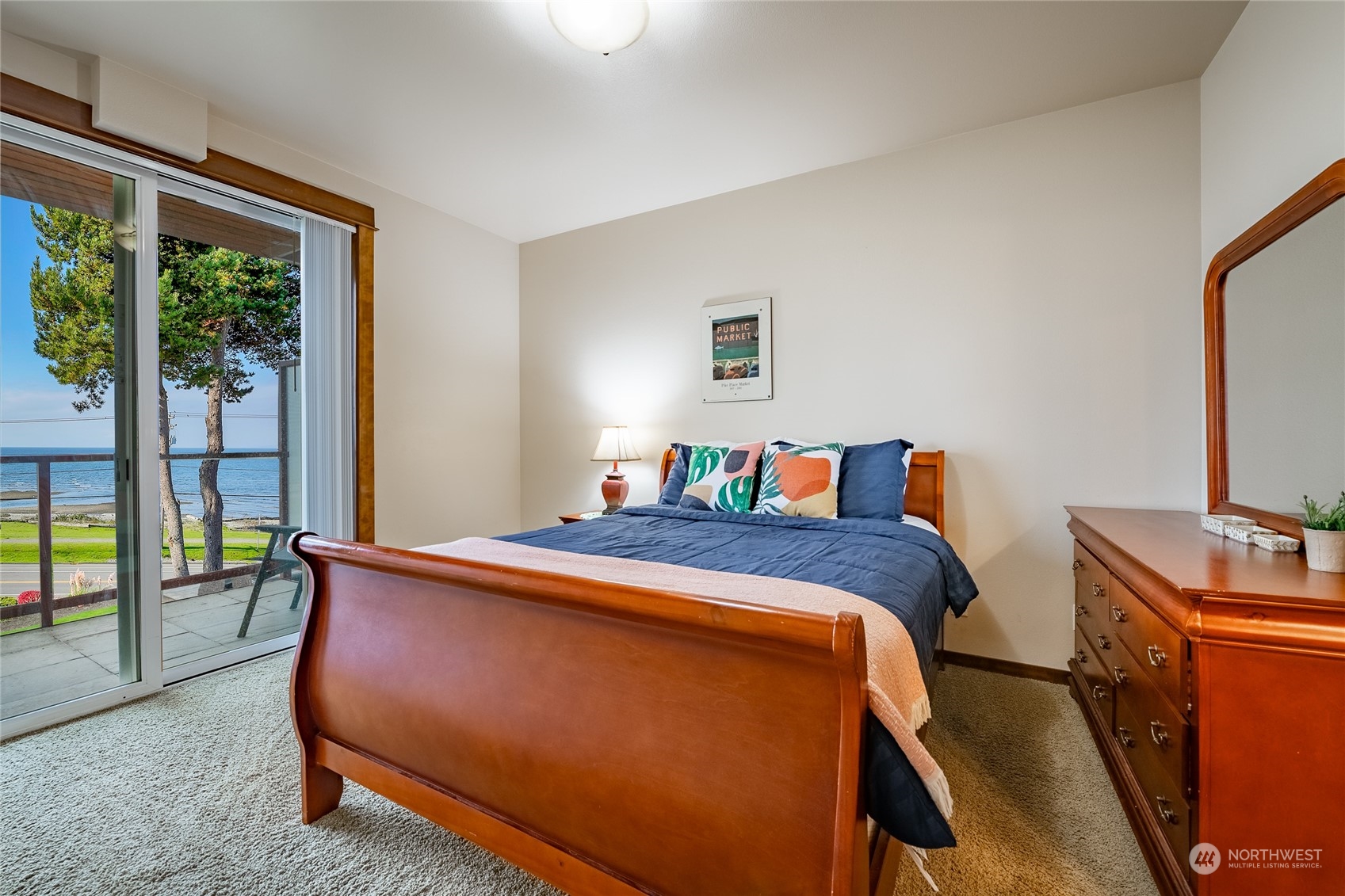 7714 Birch Bay Drive, Unit 203 Blaine, WA 98230 - Photo 15 of 25 a bed room with a bed and a desk