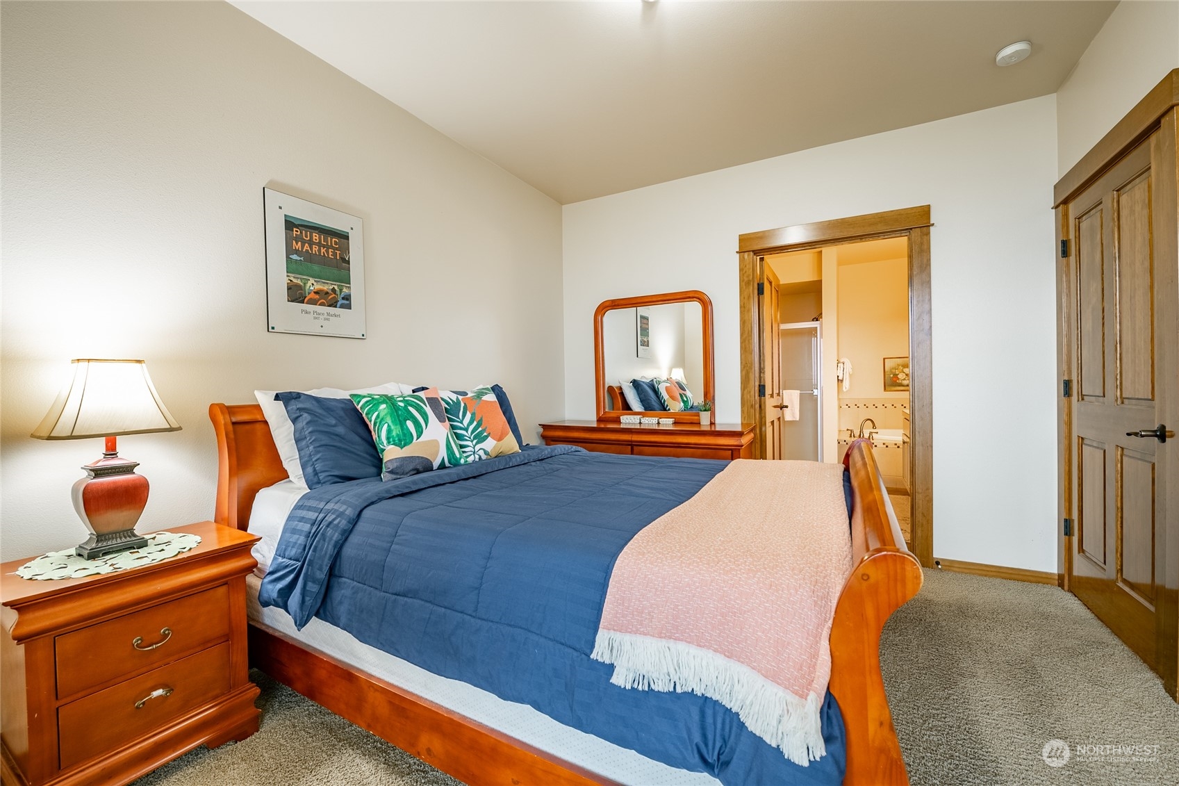 7714 Birch Bay Drive, Unit 203 Blaine, WA 98230 - Photo 16 of 25 a bed room with a bed and a lamp
