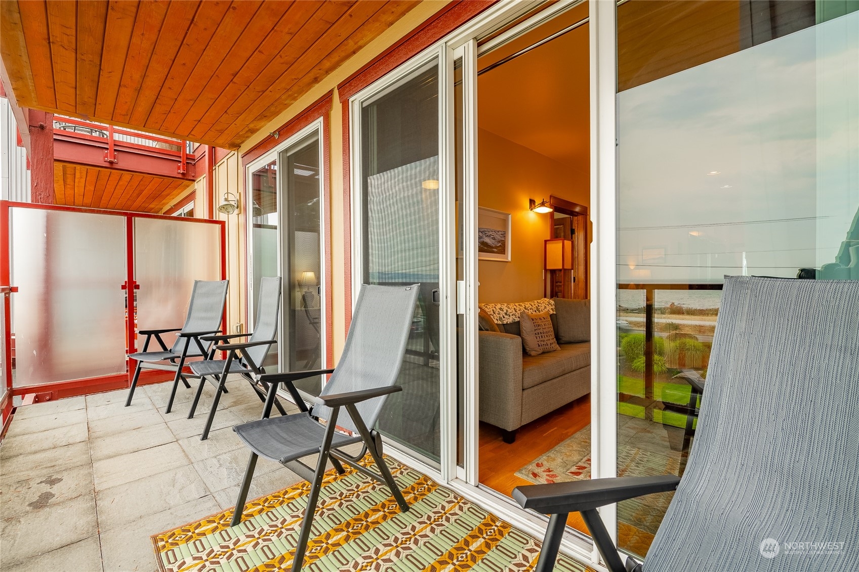 7714 Birch Bay Drive, Unit 203 Blaine, WA 98230 - Photo 20 of 25 a balcony with table and chairs