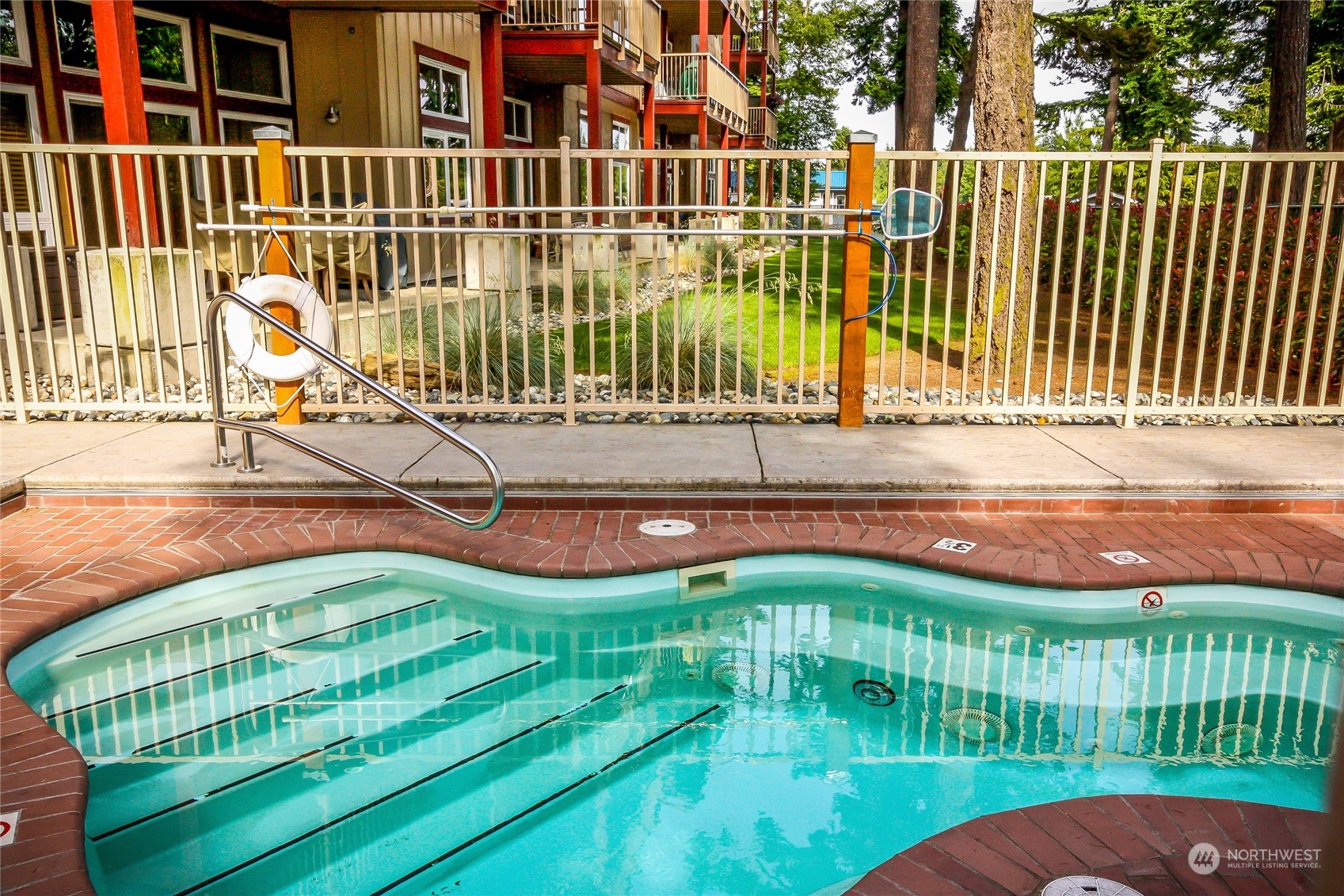 7714 Birch Bay Drive, Unit 203 Blaine, WA 98230 - Photo 22 of 25 a view of a balcony with a swimming pool