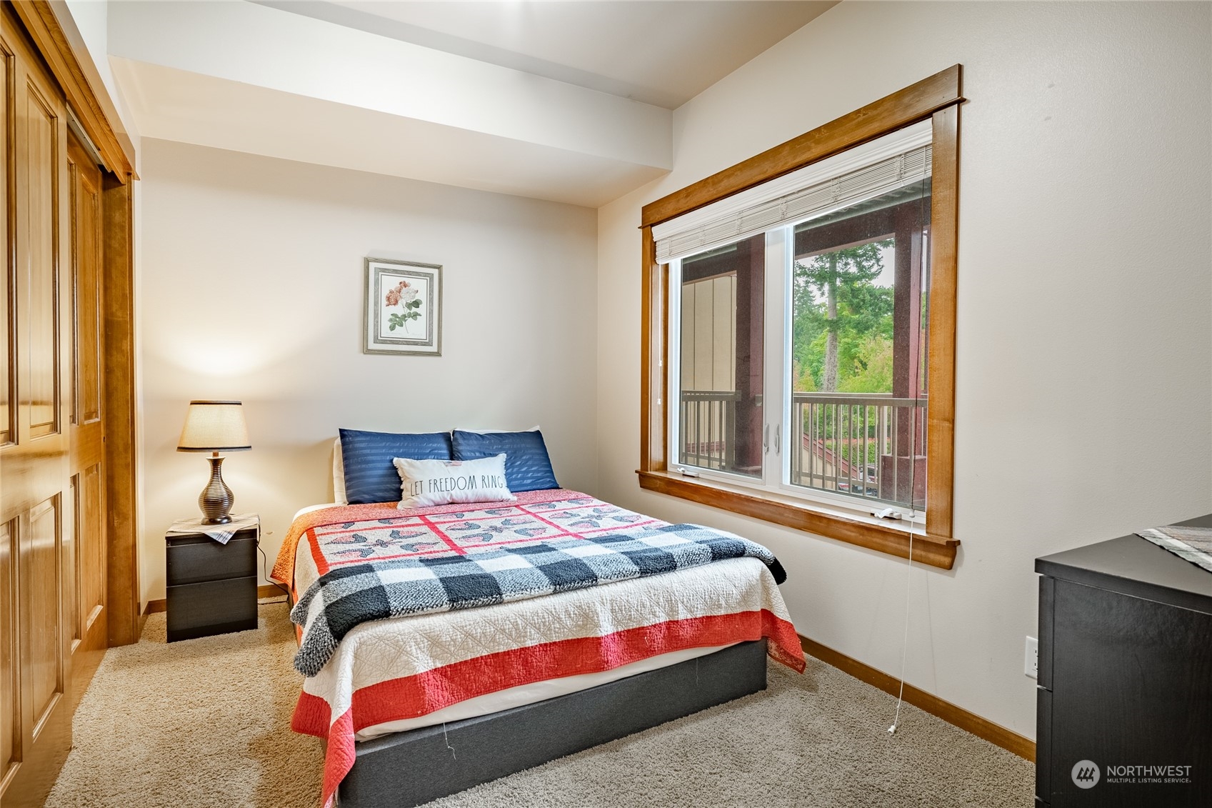 7714 Birch Bay Drive, Unit 203 Blaine, WA 98230 - Photo 6 of 25 a bedroom with a bed and a window