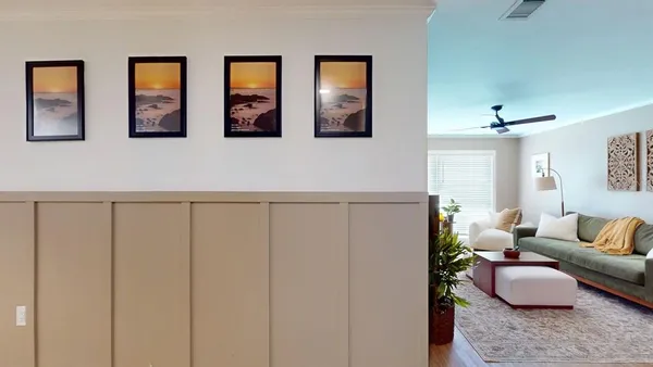 a living room with furniture and window