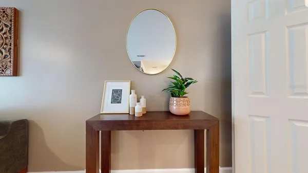 a room with a table and chairs