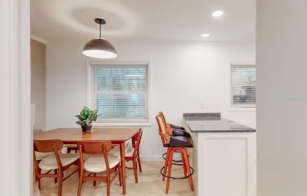 a bathroom with a sink a toilet and vanity