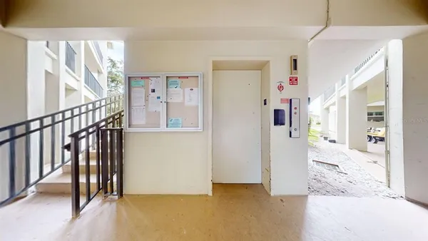 a view of building with yard