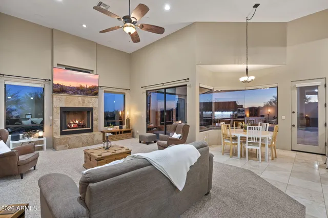 a view of a hallway with wooden floor and glass door