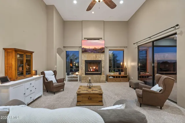 a en suite bathroom with a granite countertop sink and a mirror