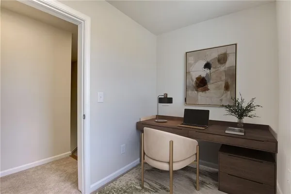 a room with a table and chairs