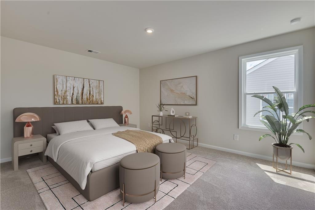 3280 Croftside Commons Powder Springs, GA 30127 - Photo 12 of 31 a bedroom with a large bed and a potted plant