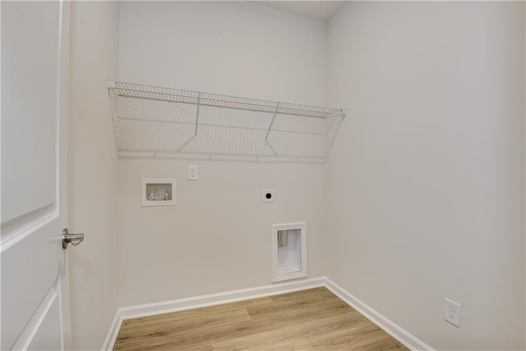 3280 Croftside Commons Powder Springs, GA 30127 - Photo 30 of 31 a view of a room with wooden floor