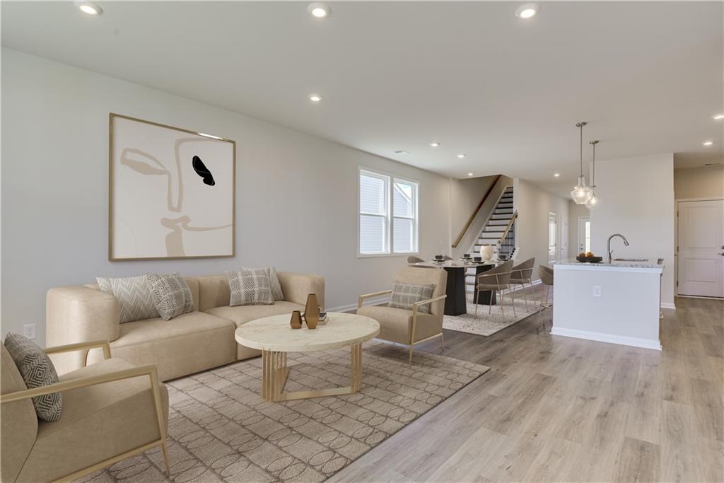 3280 Croftside Commons Powder Springs, GA 30127 - Photo 5 of 31 a living room with furniture and a wooden floor