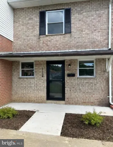 a brick house with a outdoor space