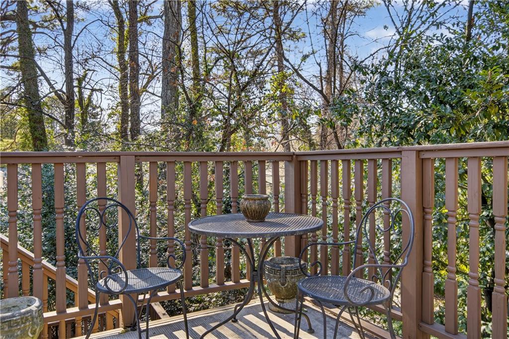 613 Pelham Road Northeast Atlanta, GA 30324 - Photo 17 of 24 a view of a balcony with chairs