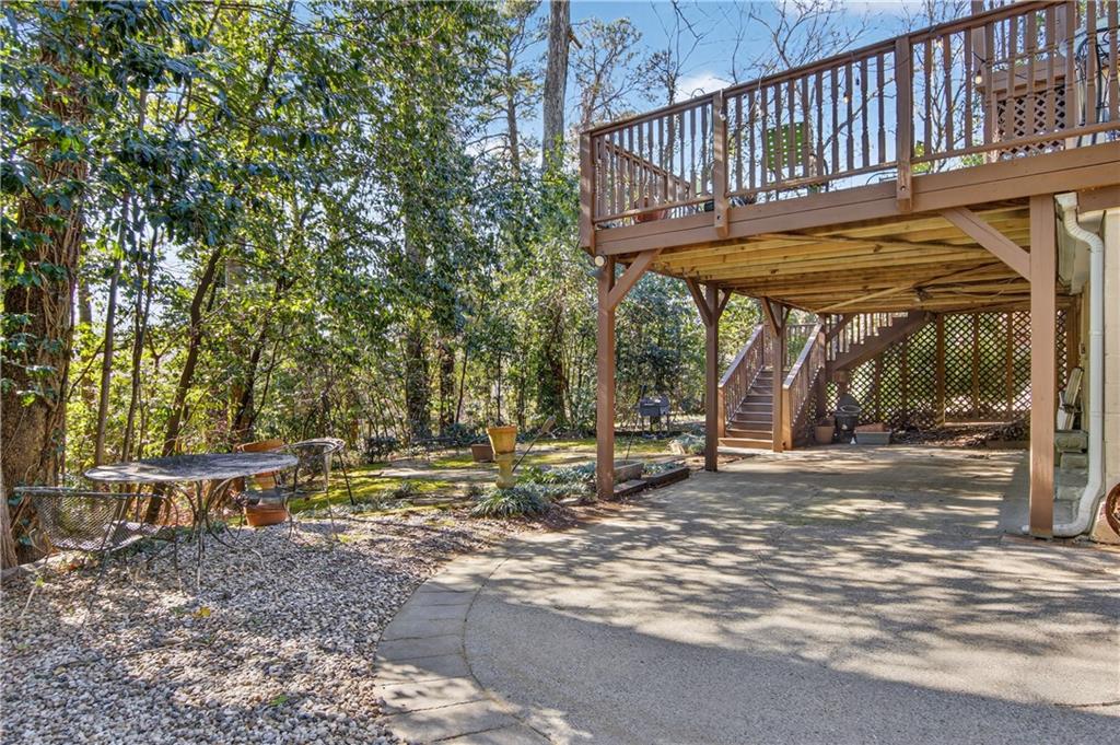 613 Pelham Road Northeast Atlanta, GA 30324 - Photo 19 of 24 a view of a house with backyard and sitting area