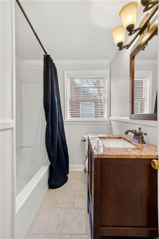 613 Pelham Road Northeast Atlanta, GA 30324 - Photo 8 of 24 a bathroom with a granite countertop sink and a mirror