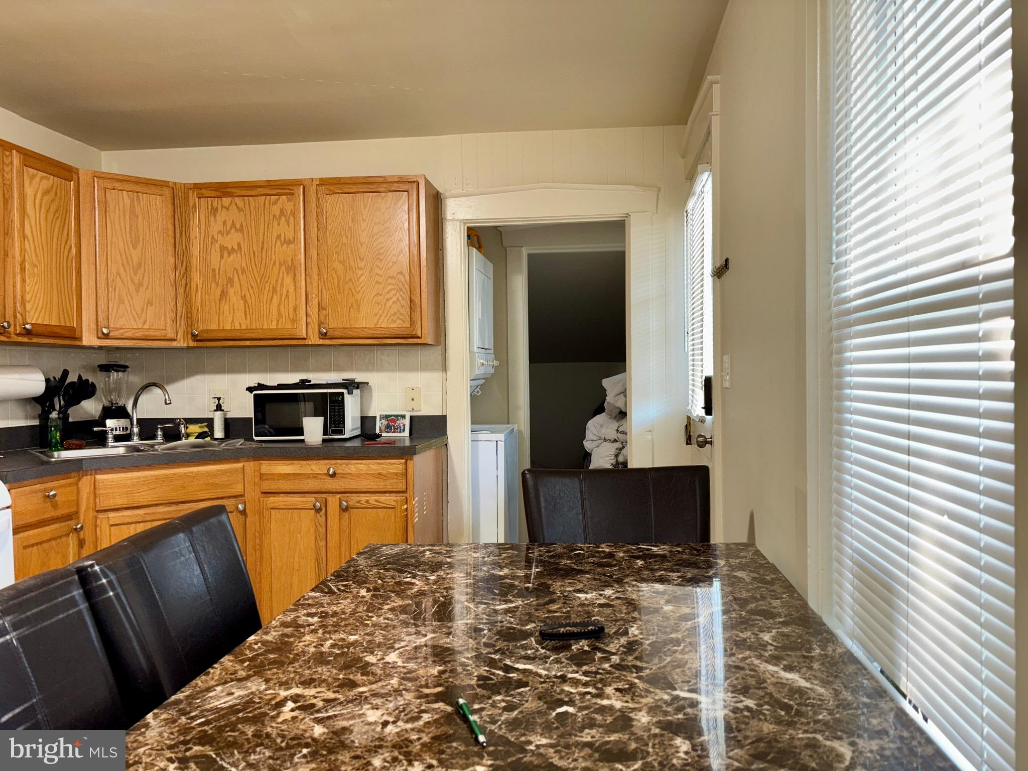 179 Charles Road Lancaster, PA 17603 - Photo 12 of 29 a kitchen with stainless steel appliances granite countertop a refrigerator and a stove top oven