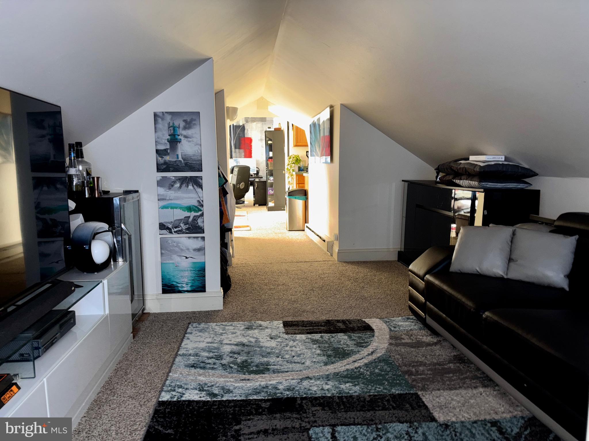 179 Charles Road Lancaster, PA 17603 - Photo 16 of 29 a living room with furniture and a rug