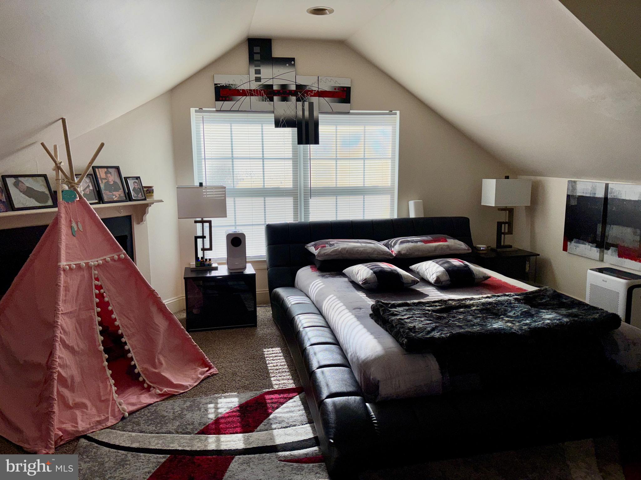 179 Charles Road Lancaster, PA 17603 - Photo 22 of 29 a living room with furniture and a window