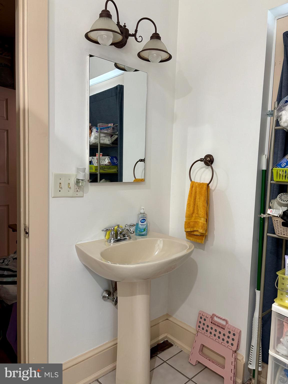 179 Charles Road Lancaster, PA 17603 - Photo 26 of 29 a bathroom with a sink and a mirror