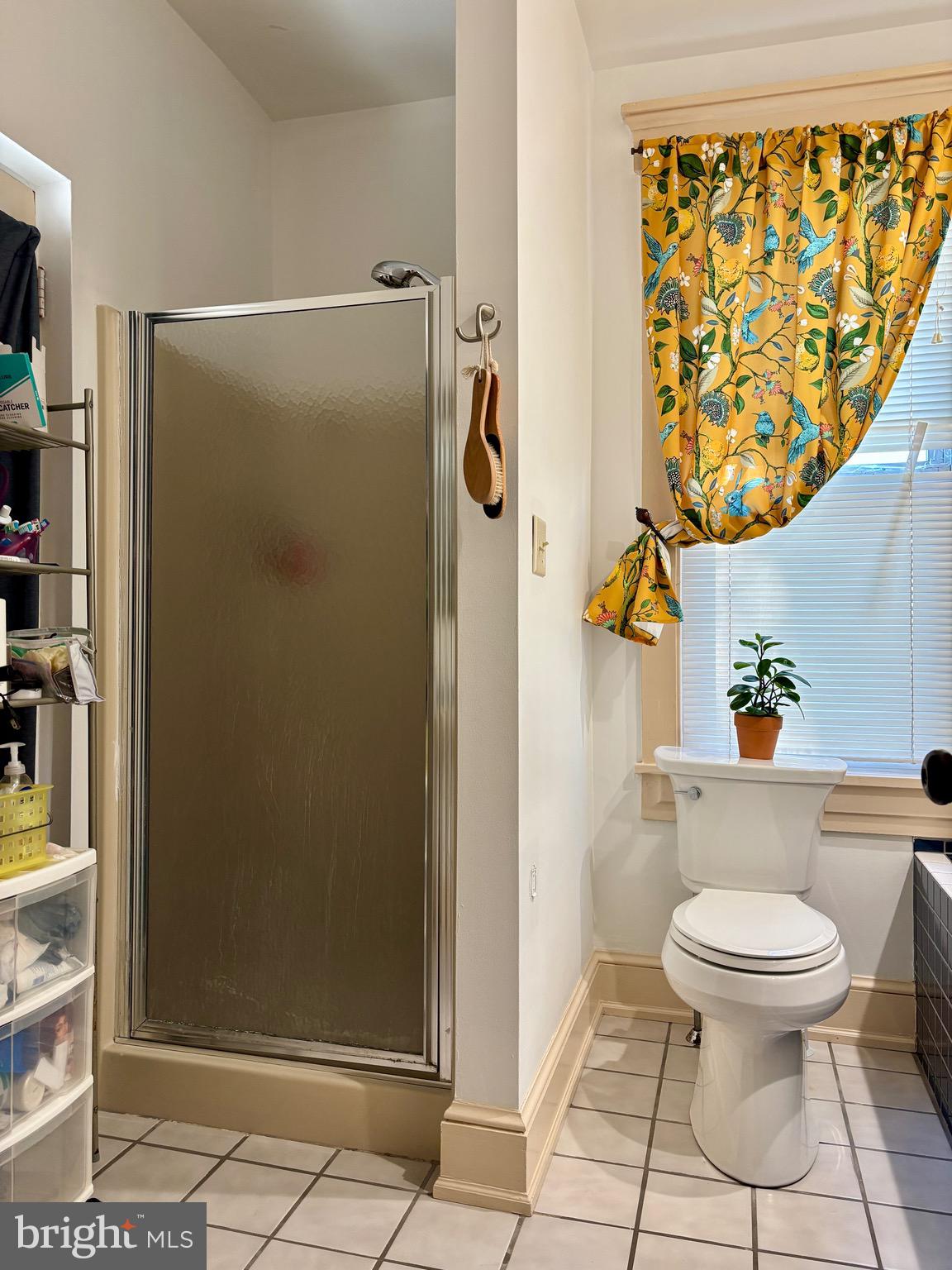 179 Charles Road Lancaster, PA 17603 - Photo 28 of 29 a bathroom with a toilet and a shower