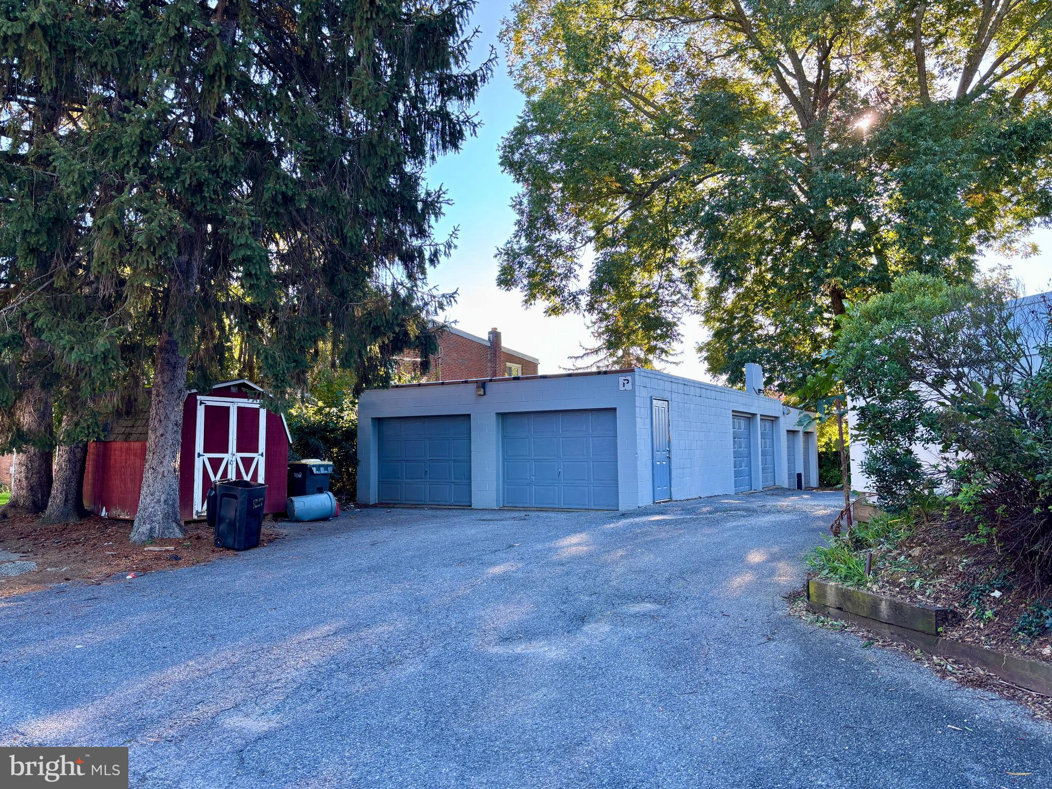 179 Charles Road Lancaster, PA 17603 - Photo 9 of 29 a wooden fence with trees in front of it