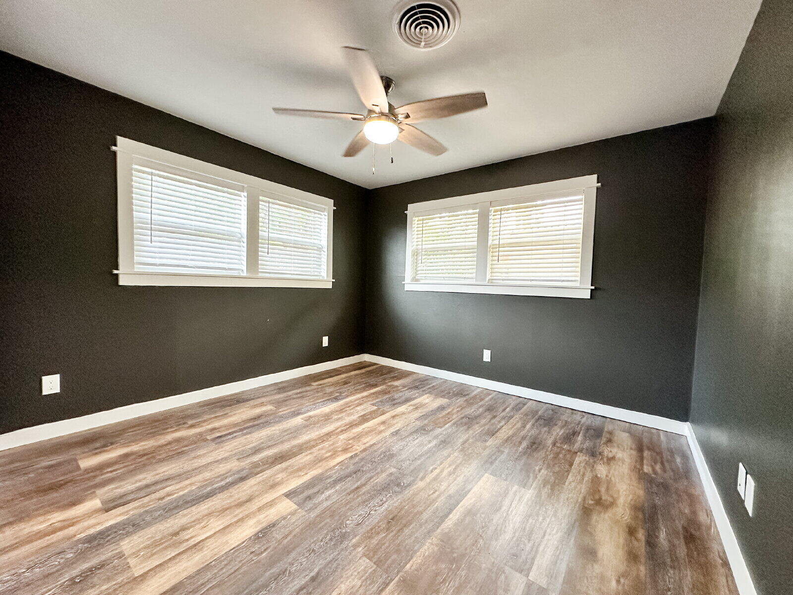 2608 Raleigh Avenue Lubbock, TX 79410 - Photo 7 of 23 a view of a livingroom with a ceiling fan and window