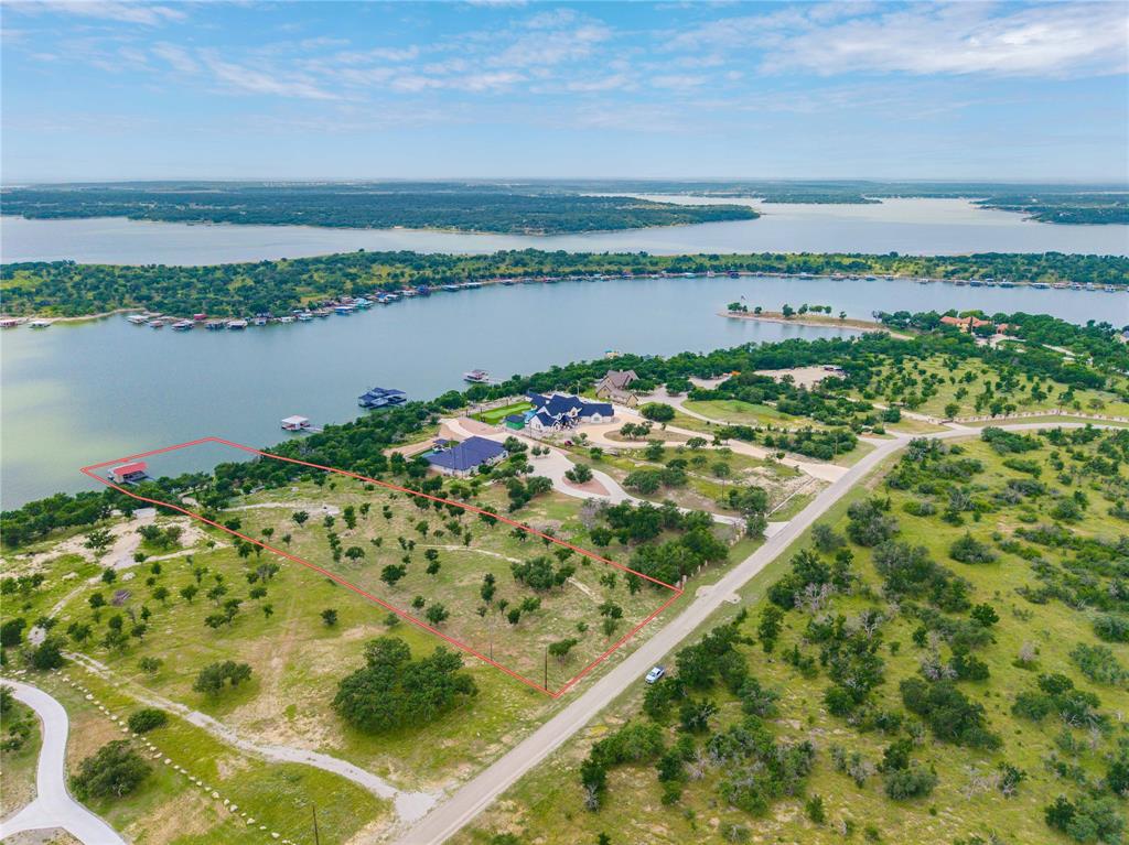 977 Deep Water Road May, TX 76857 - Photo 32 of 36 a view of a lake with a city view