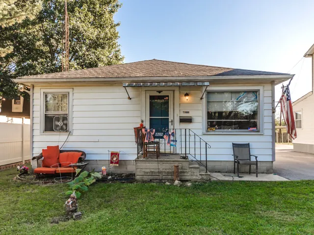 a front view of a house with patio