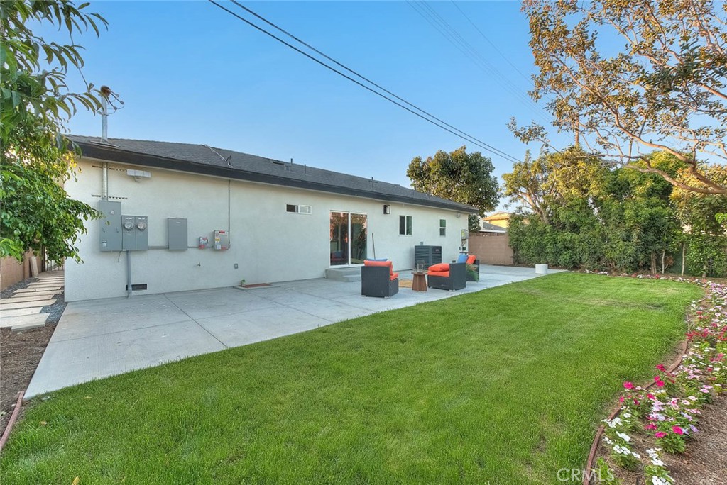 752 Rio Del Sol Avenue Montebello, CA 90640 - Photo 59 of 62 a front view of a house with a yard and garage
