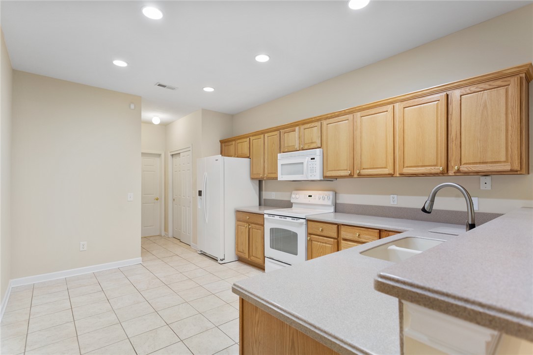 155 Life Style Lane Anderson, SC 29621 - Photo 13 of 49 Bright and open, this kitchen features ample cabinet space and modern appliances for effortless living.