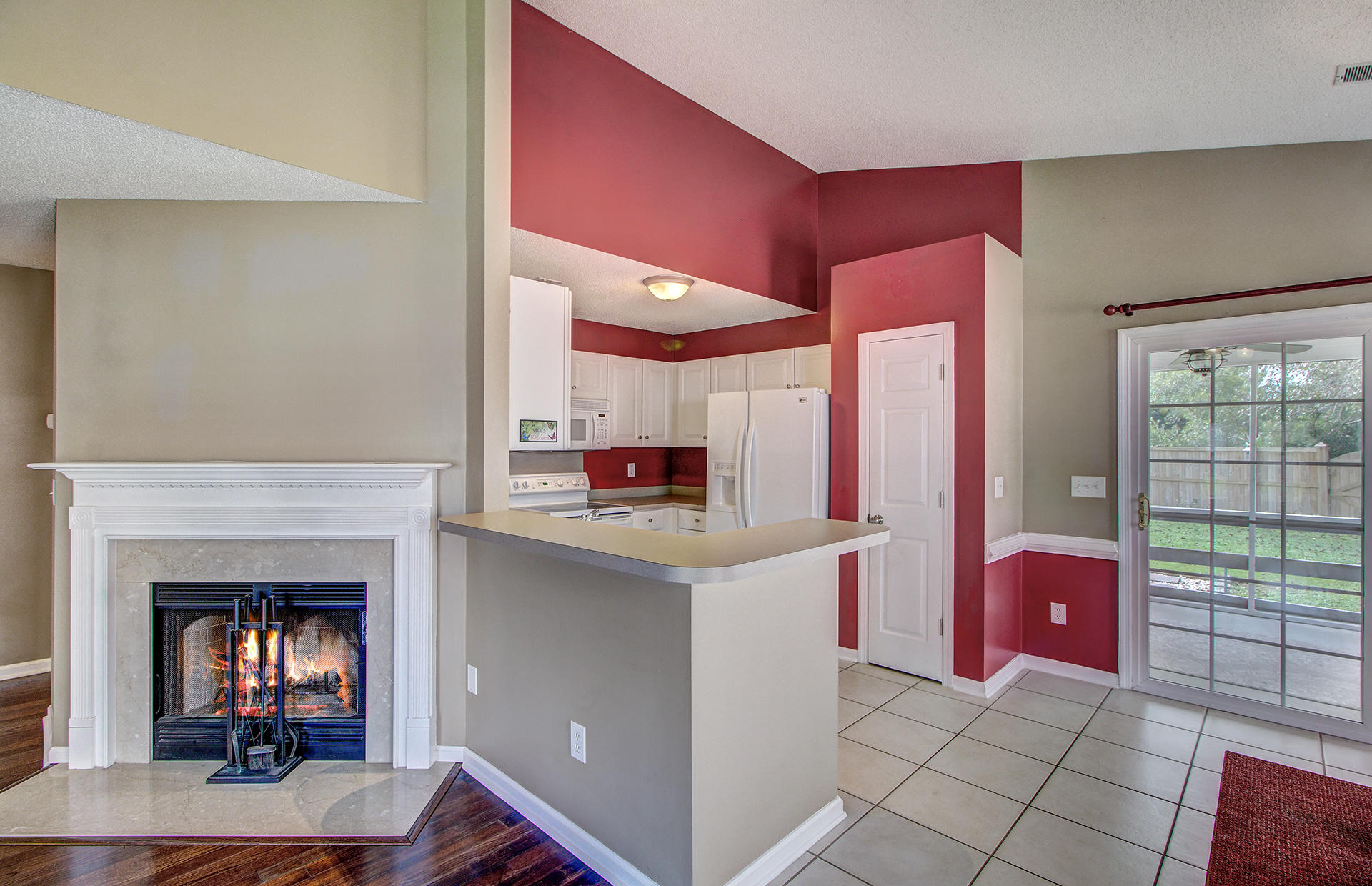 124 2 Pond Loop Ladson, SC 29456 - Photo 11 of 31 Kitchen and Fireplace