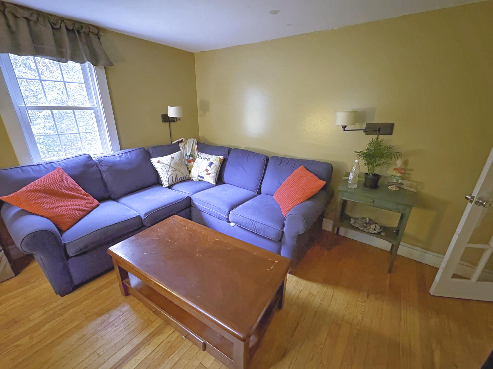 13 Allen Street Harwich, MA 02645 - Photo 14 of 31 a living room with furniture and a window