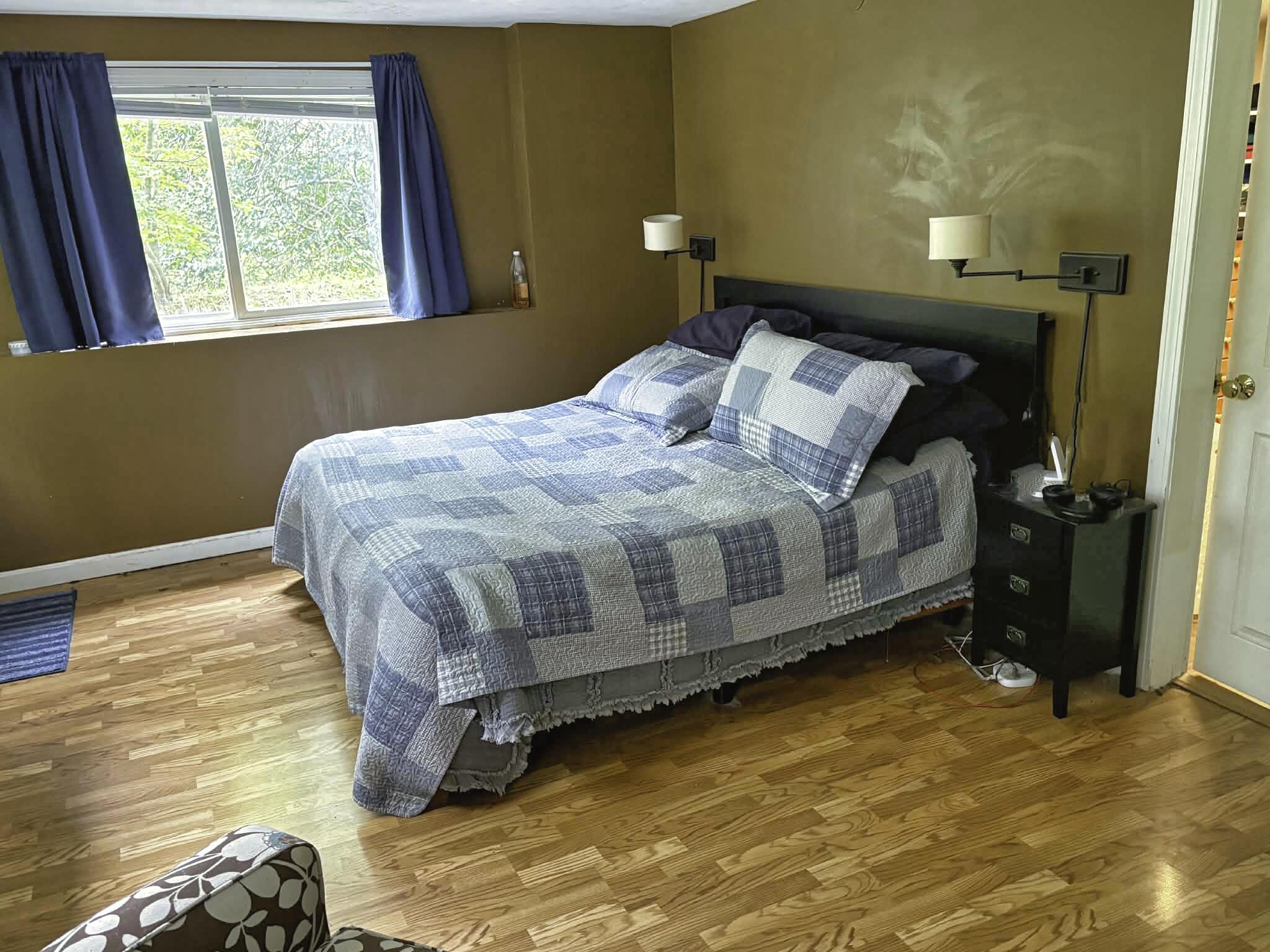 13 Allen Street Harwich, MA 02645 - Photo 18 of 31 a bedroom with a bed and a window