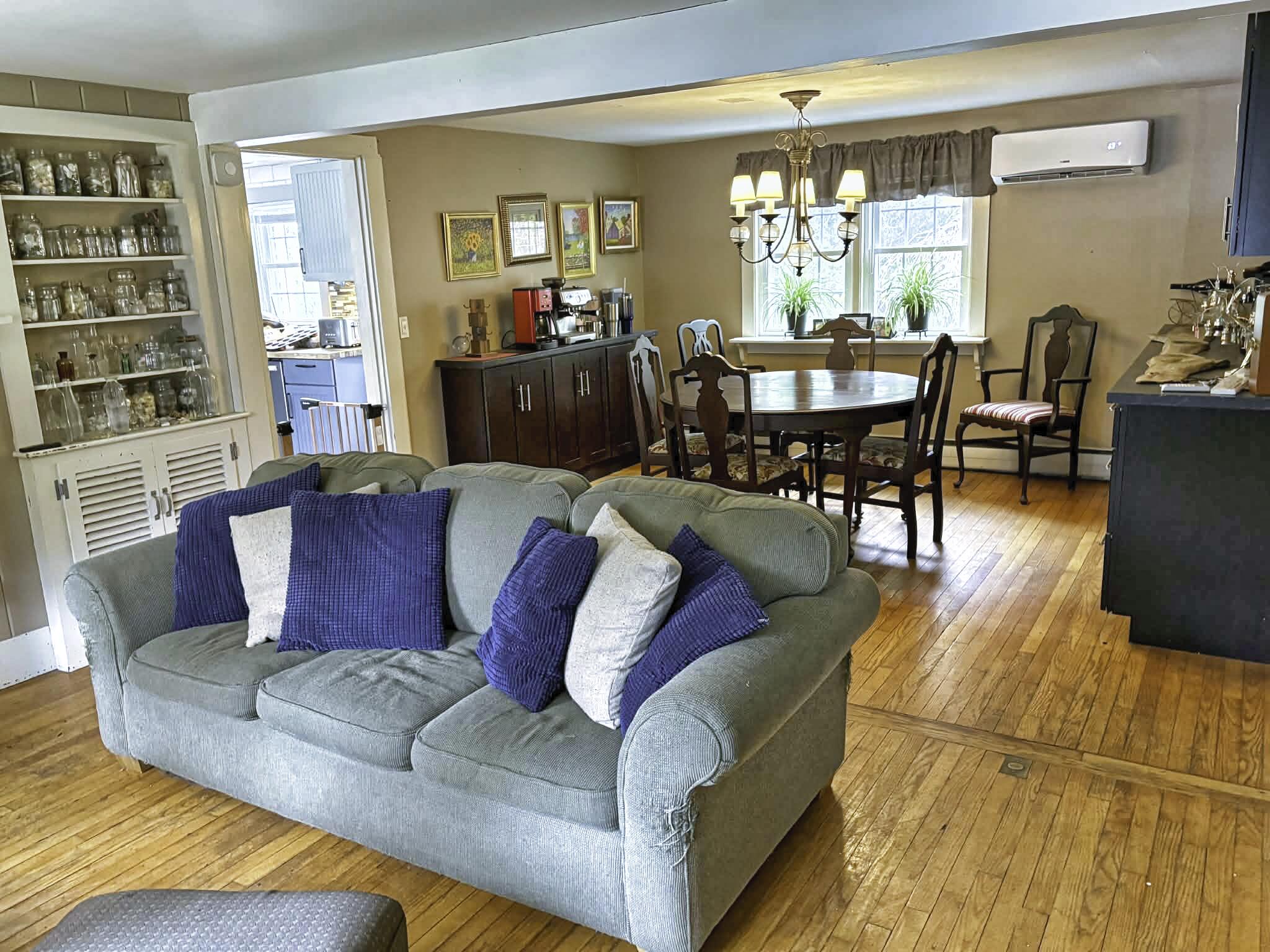 13 Allen Street Harwich, MA 02645 - Photo 10 of 31 a living room with furniture and a large window