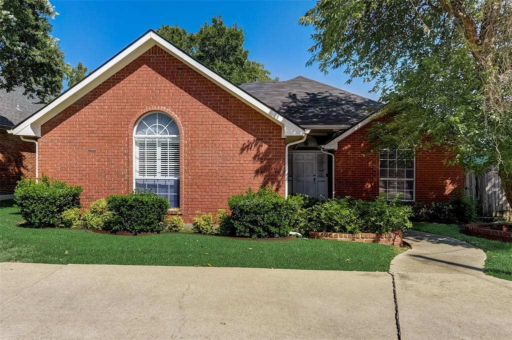 17708 Hillcrest Road Dallas, TX 75252 - Photo 1 of 1 a front view of a house with a yard