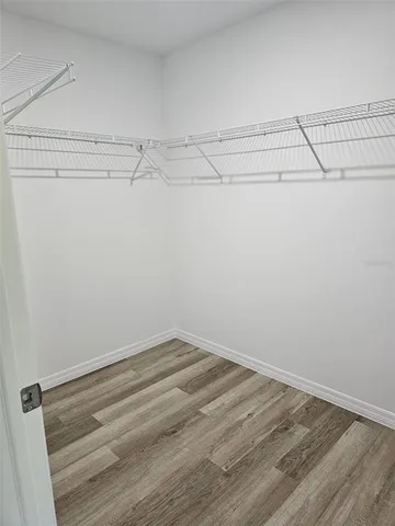 a view of a room with racks on the wall