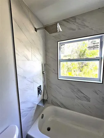 a bathroom with a bathtub