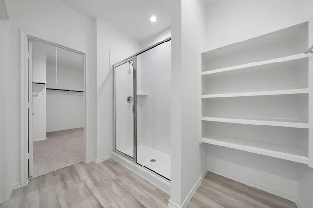a view of an empty walk in closet