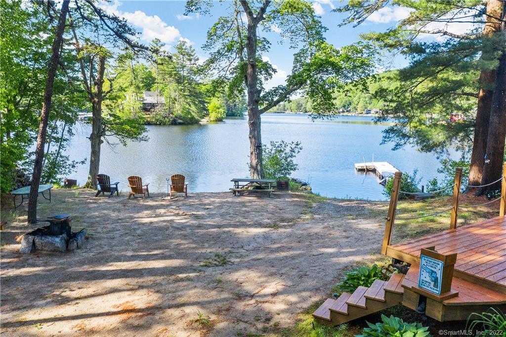 Firepit, deck, private sandy beach, dock and so much more