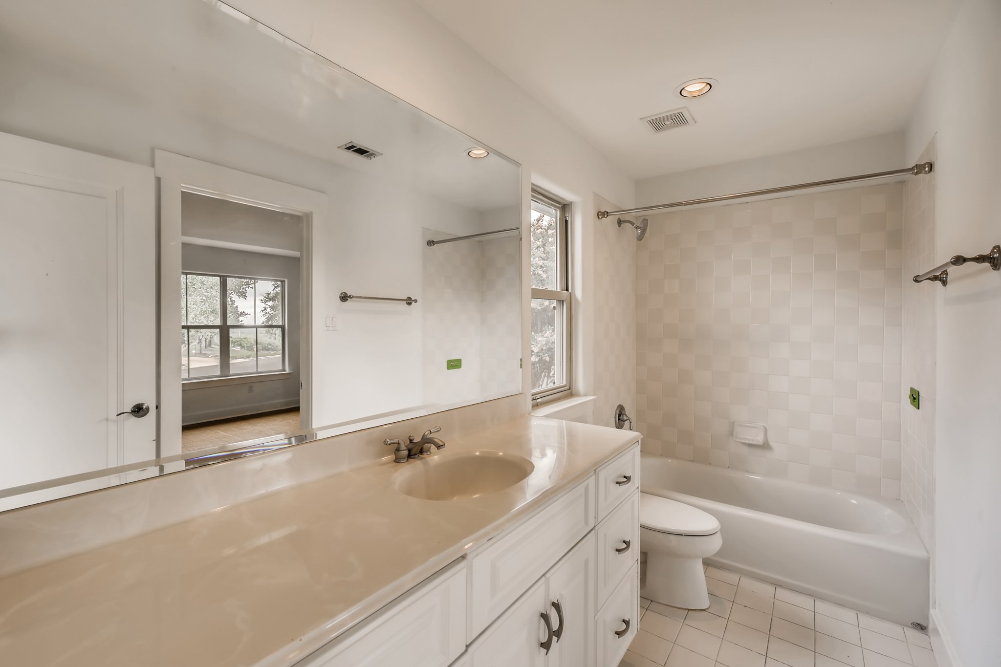 2800 Waymaker Way, Unit 27 Austin, TX 78746 - Photo 11 of 17 Full bath featuring vanity, shower / bathtub combination, recessed lighting, and light tile patterned flooring