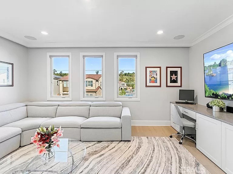 65 Rockinghorse Irvine, CA 92602 - Photo 20 of 45 a living room with furniture and a couch