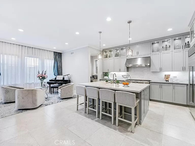 65 Rockinghorse Irvine, CA 92602 - Photo 5 of 45 a kitchen with a large counter top space appliances and a window