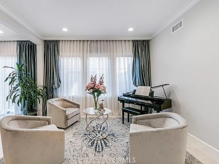 65 Rockinghorse Irvine, CA 92602 - Photo 9 of 45 a living room with furniture and a potted plant
