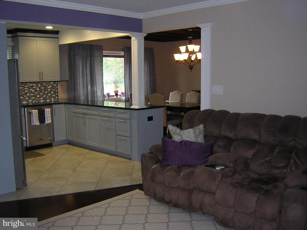 18 Idolstone Road Levittown, PA 19057 - Photo 5 of 28 Living Room to Kitchen and Dining Room