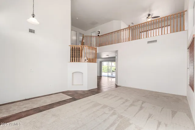 a view of a hallway with a white walls