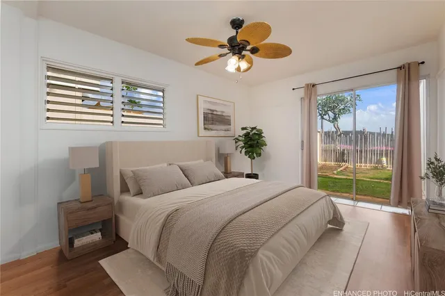 a bed room with a bed and a chandelier